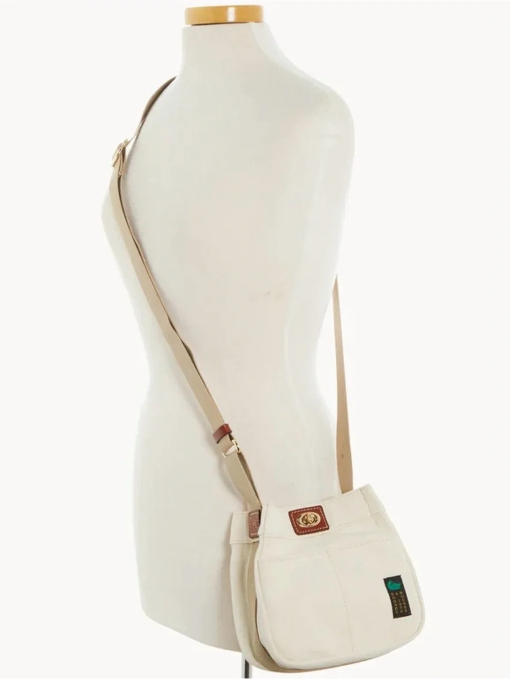 Dooney & Bourke Cream Canvas Messenger Bag with Tan Trim
